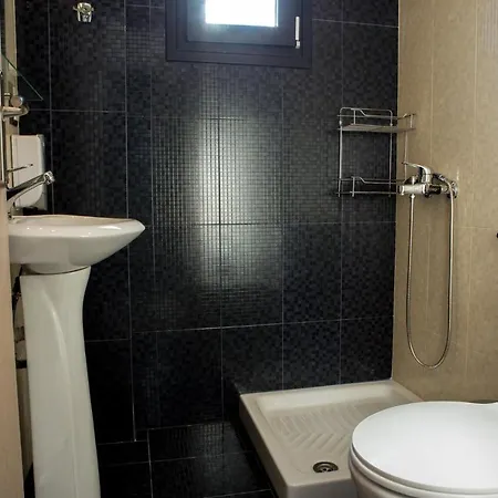 Blue Waves Luxury Suites By The Sea Plomari Room photo